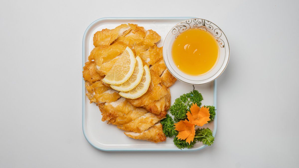Fried chicken in lemon sauce