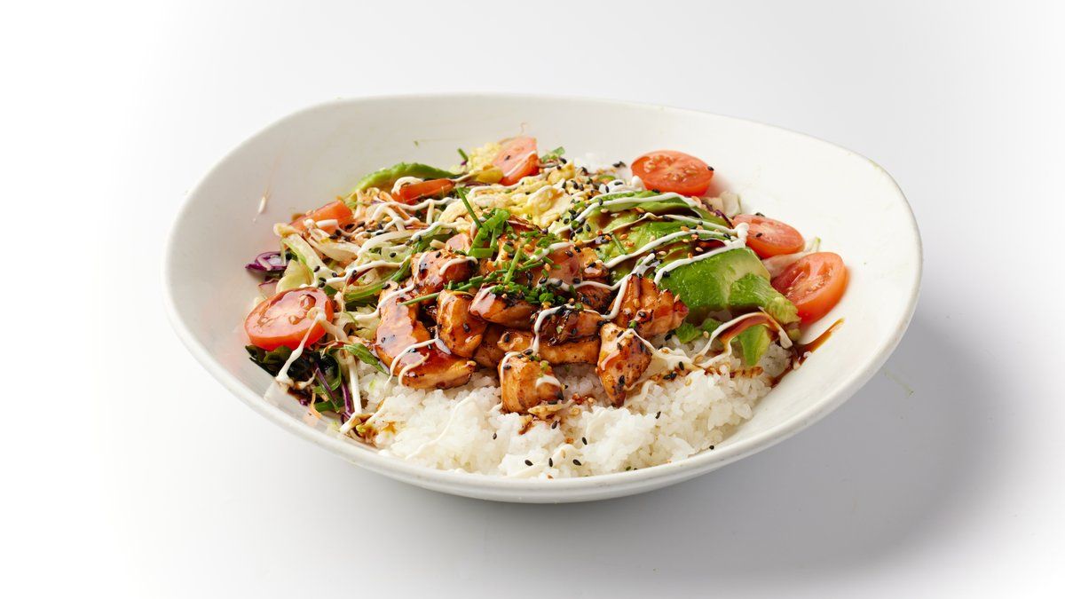 Rice bowl with salad, salmon kabayaki, avocado, Goma sauce