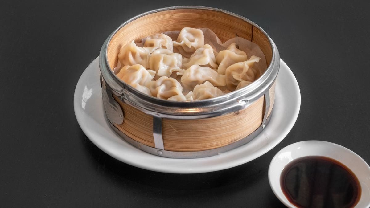 7. Steamed Dumplings (14pcs) / Höyrytetyt Dumplingeja (14kpl) / 蒸饺 (14个)